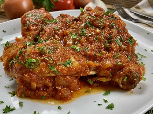 Pollo con tomate | Receta fácil y rápida